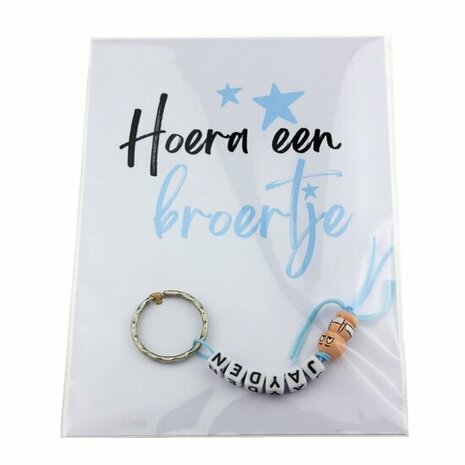 Geboortebedankje gelukspoppetjes baby sleutelhanger met naam hoera een broertje of zusje